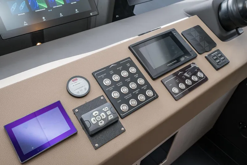  Yacht Photos Pics Control panel of 2020 Azimut Fly 50 yacht with various navigation instruments and displays.