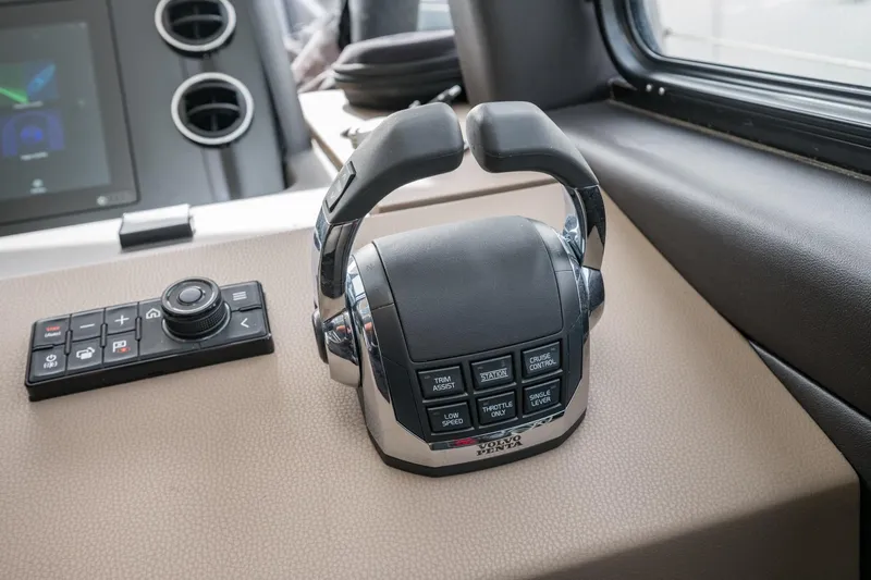  Yacht Photos Pics Throttle control panel on 2020 Azimut Fly 50 yacht dashboard, featuring Volvo Penta controls.