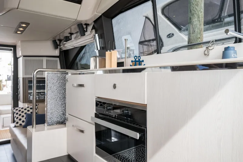  Yacht Photos Pics Luxurious interior of 2020 Azimut Fly 50 yacht with modern kitchen design.