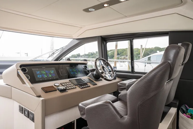  Yacht Photos Pics Luxurious helm of 2020 Azimut Fly 50 yacht with advanced navigation controls.