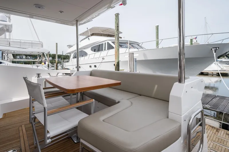  Yacht Photos Pics Azimut Fly 50 yacht 2020 model, featuring elegant outdoor seating and dining area.