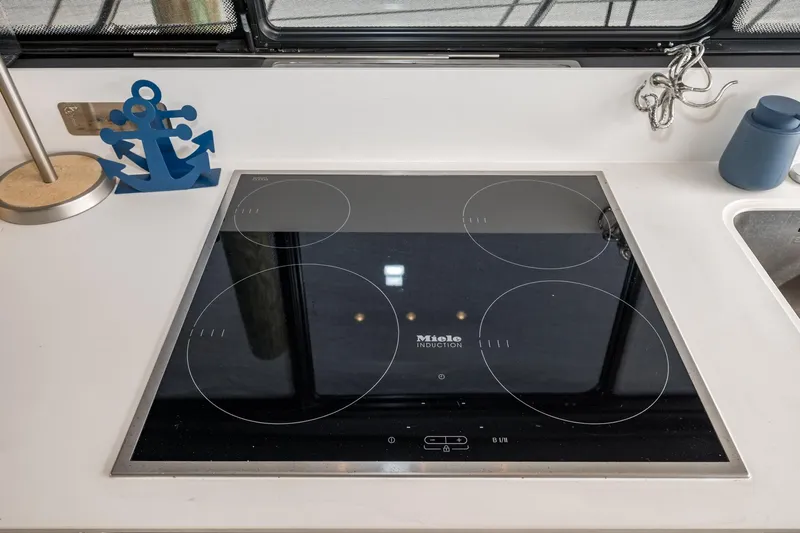  Yacht Photos Pics Modern kitchen with Miele induction cooktop on 2020 Azimut Fly 50 yacht.