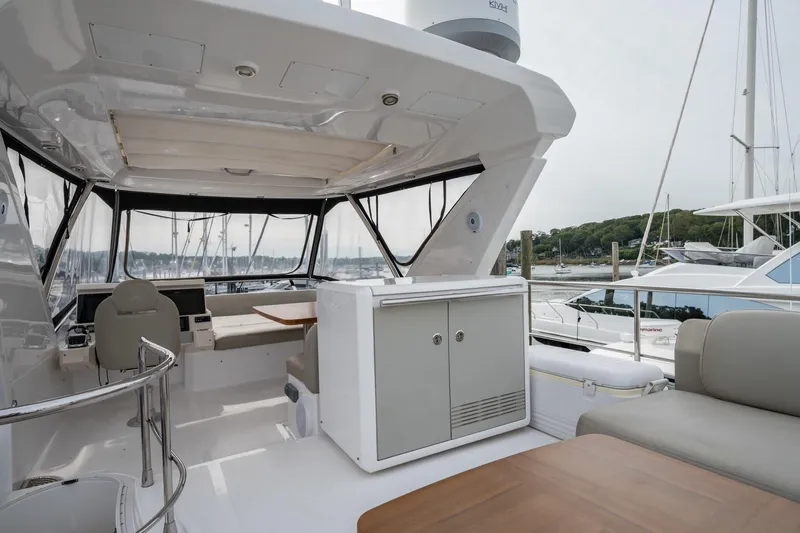  Yacht Photos Pics Luxurious 2020 Azimut Fly 50 yacht interior with seating and marina view.