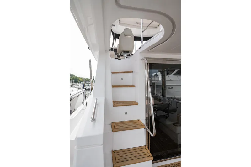  Yacht Photos Pics Staircase on 2020 Azimut Fly 50 yacht with wooden steps and sleek design.
