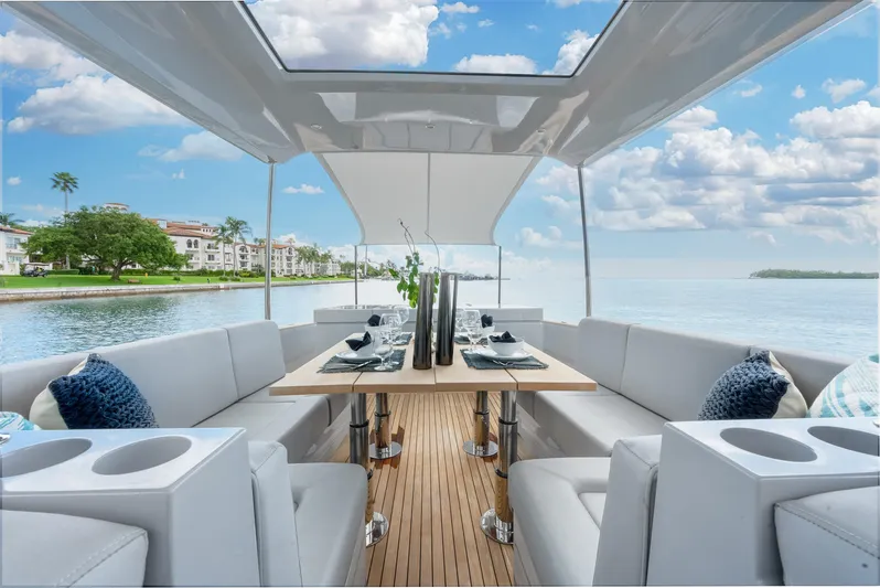 M/y Valor Yacht Photos Pics Luxurious 2021 Alen 55 yacht interior with elegant seating and scenic water view.