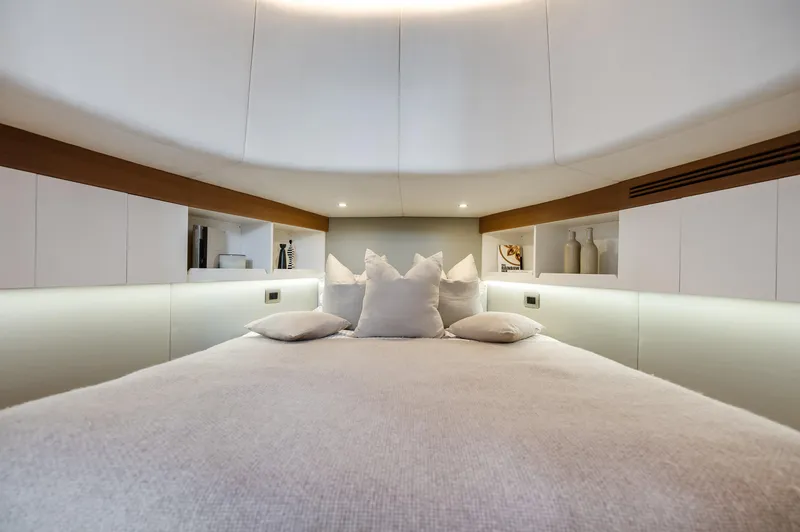 M/y Valor Yacht Photos Pics Luxurious bedroom interior of 2021 Alen 55 yacht with modern design and ambient lighting.