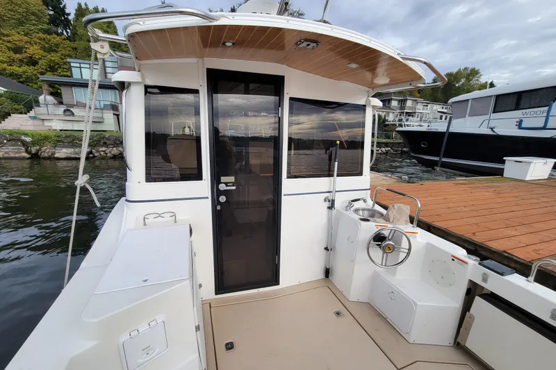  Yacht Photos Pics 2017 Cutwater C28 boat docked, featuring a spacious cockpit and modern design.