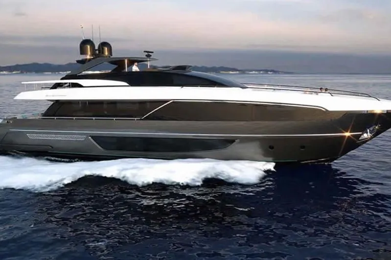 Ruzarija Yacht Photos Pics Luxurious 2020 Riva 100' Corsaro yacht cruising on open water at sunset.