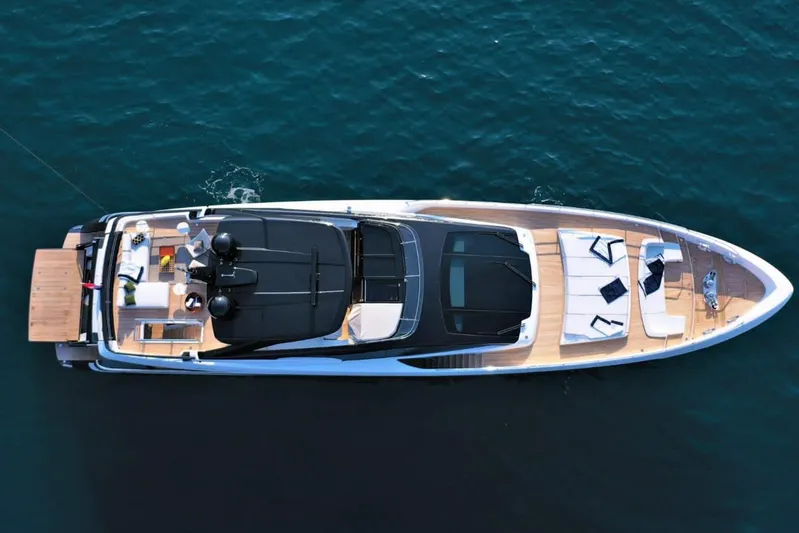 Ruzarija Yacht Photos Pics Aerial view of 2020 Riva 100' Corsaro luxury yacht on blue water.