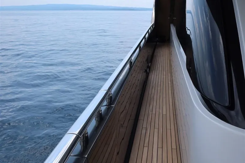 Ruzarija Yacht Photos Pics Side deck of 2020 Riva 100' Corsaro yacht with ocean view.
