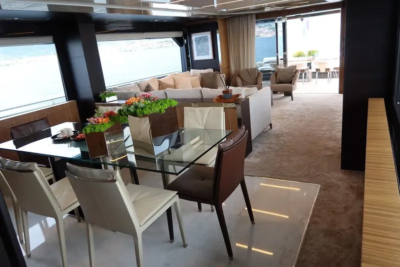 Ruzarija Yacht Photos Pics Luxurious interior of 2020 Riva 100' Corsaro yacht with elegant dining and seating areas.