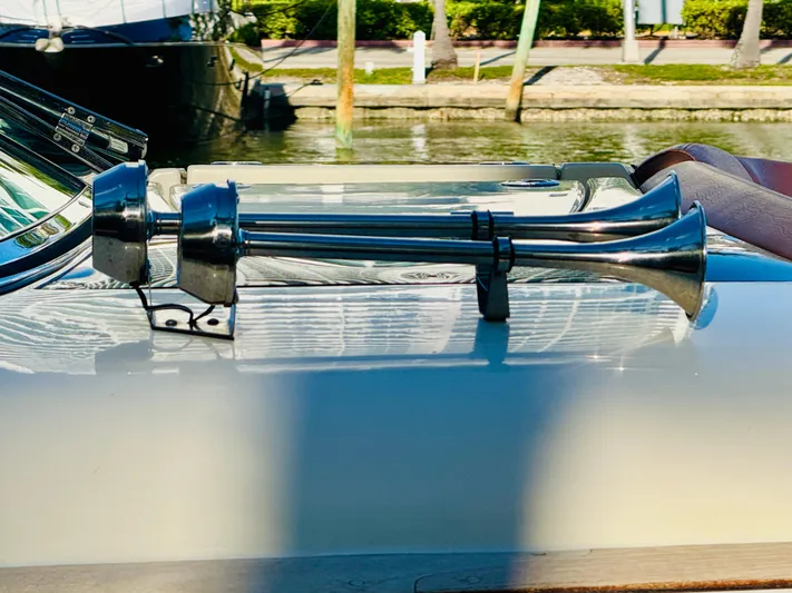  Yacht Photos Pics 2015 Chris-Craft Launch 32 boat horn detail, docked by the water.