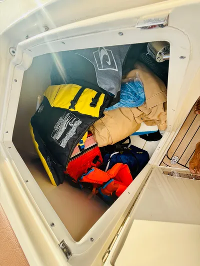  Yacht Photos Pics Storage compartment on 2015 Chris-Craft Launch 32 with life jackets and gear.