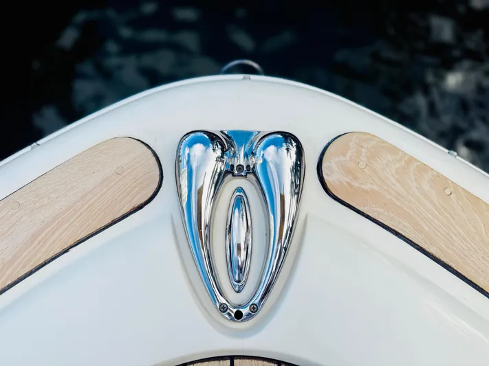  Yacht Photos Pics Bow detail of 2015 Chris-Craft Launch 32 with polished chrome and wood accents.