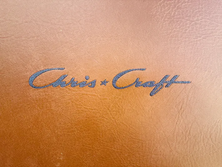  Yacht Photos Pics Chris-Craft logo on brown leather, 2015 Launch 32 model.