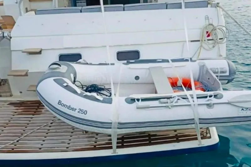  Yacht Photos Pics Dalla Pieta 52 Asterion yacht with Bomber 250 inflatable boat, 1991 model.