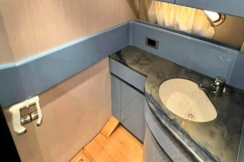  Yacht Photos Pics Bathroom interior of 1991 Dalla Pieta 52 Asterion yacht with sink and countertop.