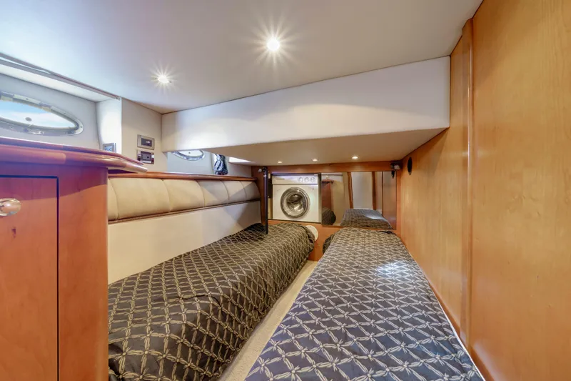 Mimosa Yacht Photos Pics 2001 Cruisers Yachts 5000 Sedan Sport interior with twin beds and washing machine.