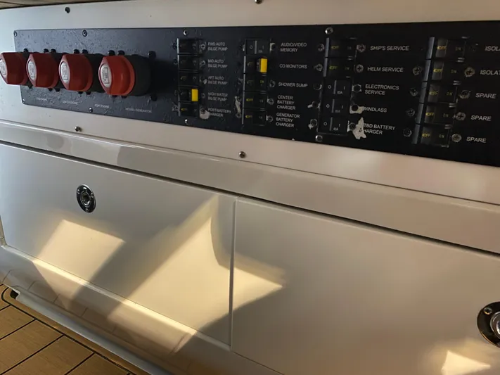Apres Sea Yacht Photos Pics Control panel of 2016 Chris-Craft Catalina 34 boat with switches and knobs.