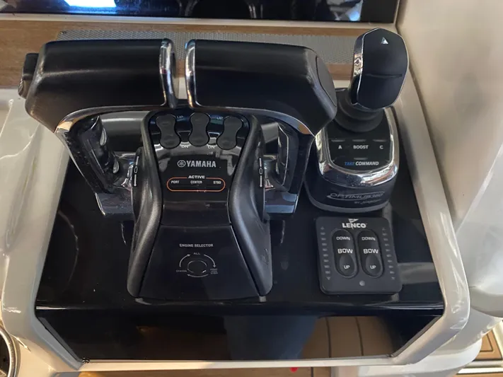 Apres Sea Yacht Photos Pics Control panel of a 2016 Chris-Craft Catalina 34 with Yamaha throttle and joystick.