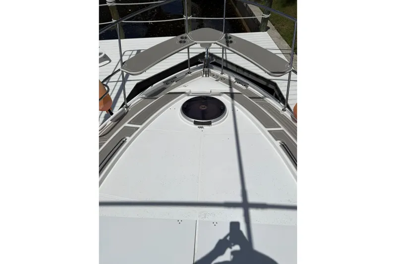  Yacht Photos Pics Bow view of 2022 Evolve 360HT yacht with sleek deck design.