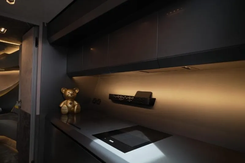  Yacht Photos Pics Luxurious interior of 2023 Tecnomar Lamborghini 63 yacht with modern design and ambient lighting.