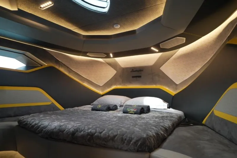  Yacht Photos Pics Luxurious interior of 2023 Tecnomar Lamborghini 63 yacht with modern design and ambient lighting.