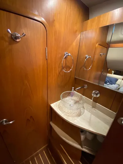 Kostas More Yacht Photos Pics Luxurious bathroom in a 2009 Tiara Yachts 4300 Sovran.