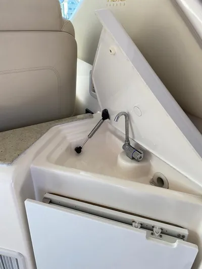 Kostas More Yacht Photos Pics Tiara Yachts 4300 Sovran 2009 kitchen area with sink.