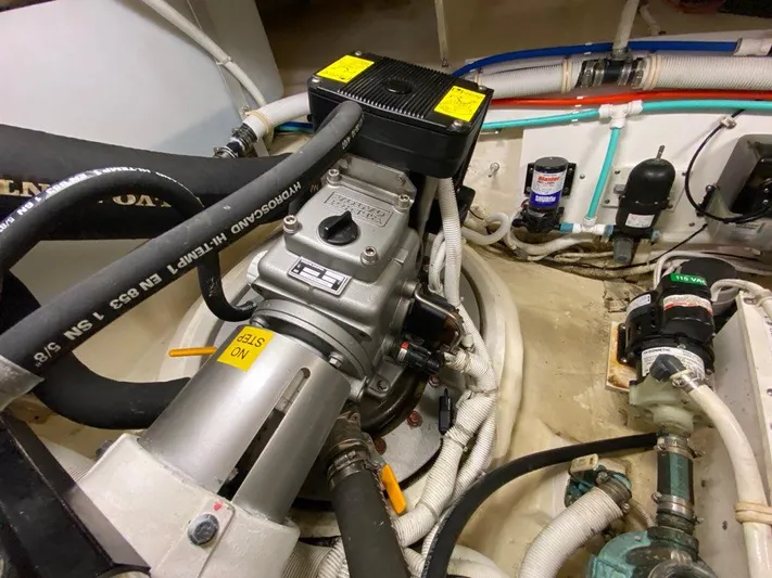 Kostas More Yacht Photos Pics Engine room of 2009 Tiara Yachts 4300 Sovran with hoses and machinery.