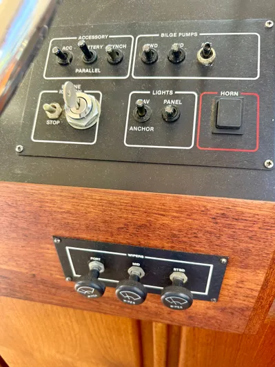 Journey's End Yacht Photos Pics Control panel of a 1989 Californian 48MY boat with switches and knobs.