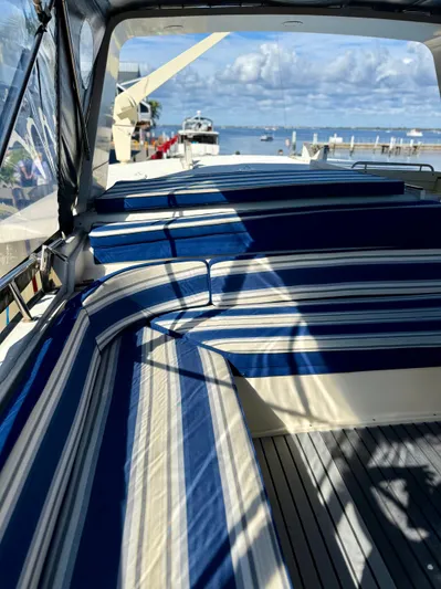 Journey's End Yacht Photos Pics Interior of a 1989 Californian 48MY yacht with striped cushions.