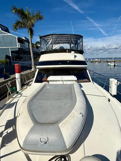 Journey's End Yacht Photos Pics 1989 Californian 48MY yacht docked with inflatable boat.