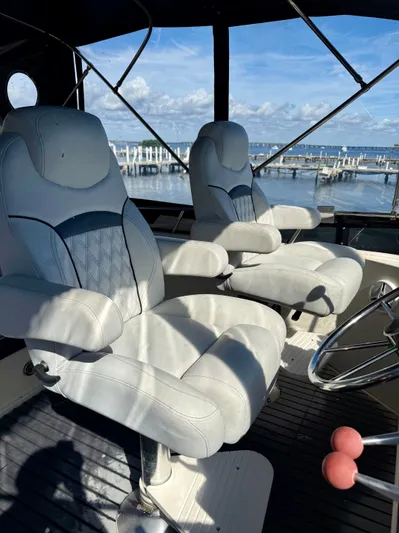 Journey's End Yacht Photos Pics Interior of a 1989 Californian 48MY yacht with white seats.