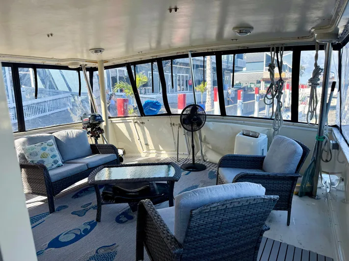 Journey's End Yacht Photos Pics Interior of a 1989 Californian 48MY yacht with cozy seating area.