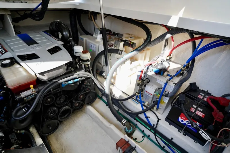  Yacht Photos Pics Engine compartment of a 2010 Sea Ray 370 Sundancer with visible wiring and components.