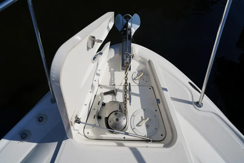  Yacht Photos Pics Anchor compartment of 2010 Sea Ray 370 Sundancer boat with chain and winch.