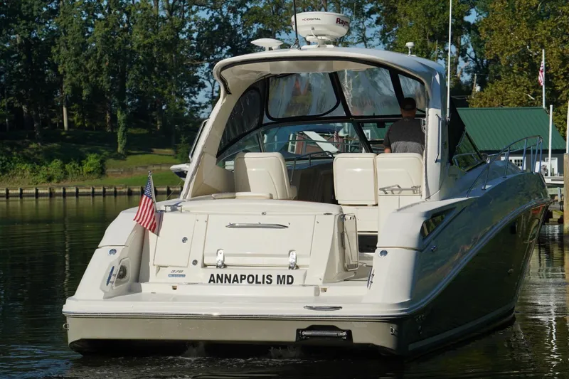  Yacht Photos Pics 2010 Sea Ray 370 Sundancer yacht docked in Annapolis, MD, with American flag.