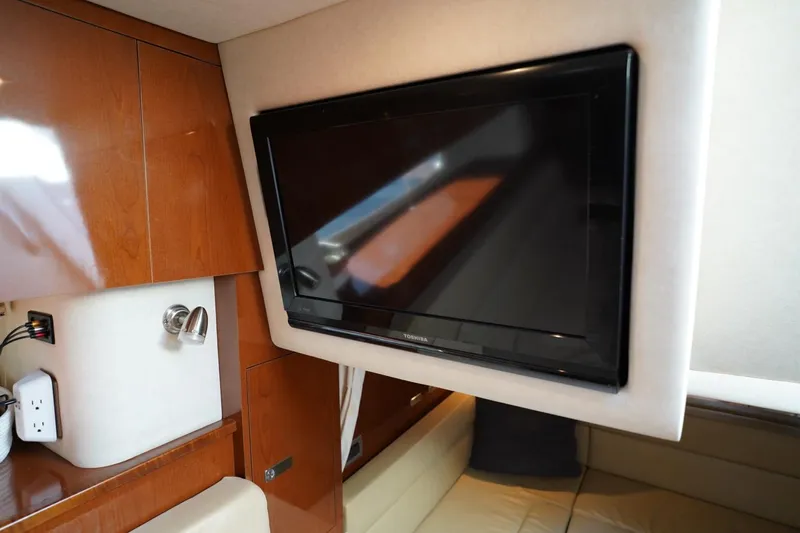  Yacht Photos Pics Interior of 2010 Sea Ray 370 Sundancer with wall-mounted Toshiba TV.