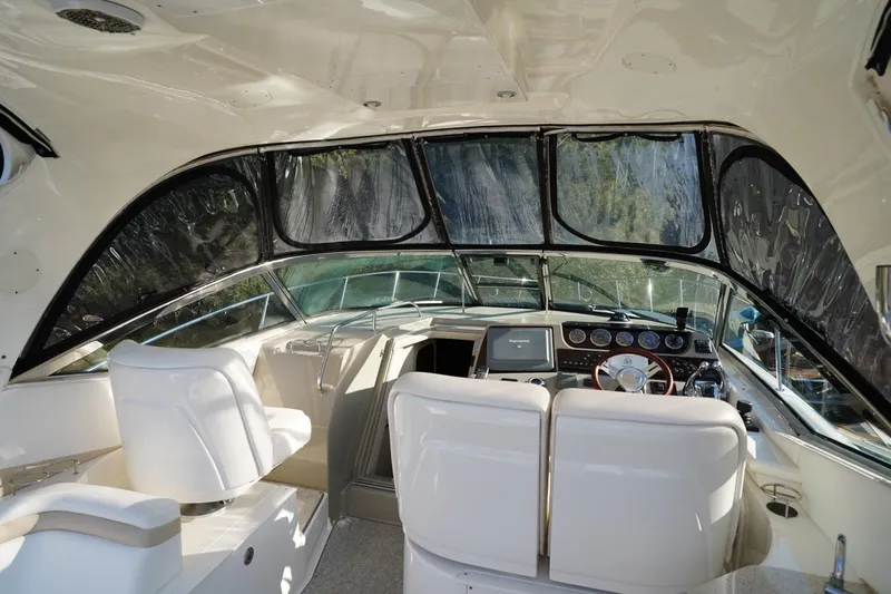  Yacht Photos Pics Interior of 2010 Sea Ray 370 Sundancer yacht with modern helm and seating.