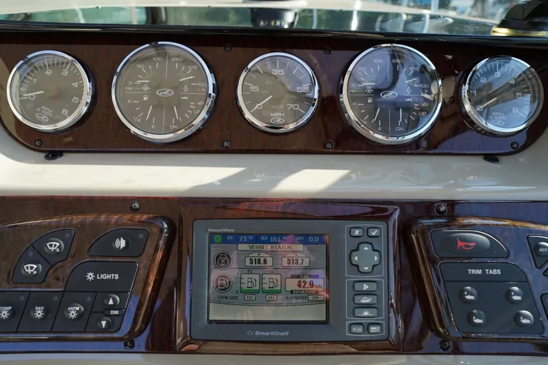  Yacht Photos Pics Dashboard of 2010 Sea Ray 370 Sundancer with gauges and navigation controls.