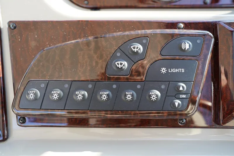  Yacht Photos Pics Control panel of a 2010 Sea Ray 370 Sundancer boat with various function buttons.