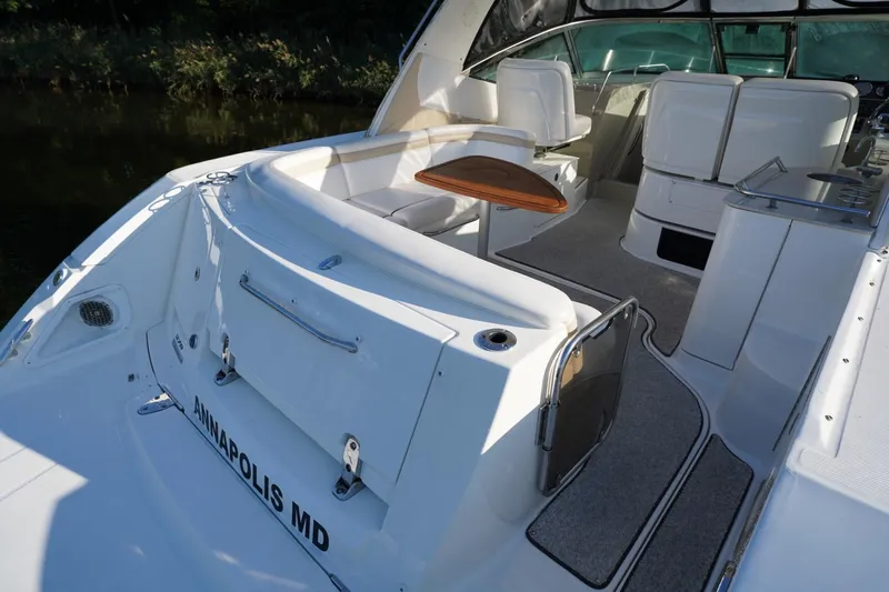  Yacht Photos Pics 2010 Sea Ray 370 Sundancer boat interior with seating and table, docked in Annapolis, MD.