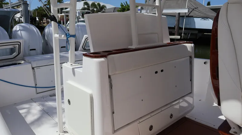 Yacht Photos Pics 2019 Everglades 435 Center Console boat interior with seating and storage compartments.