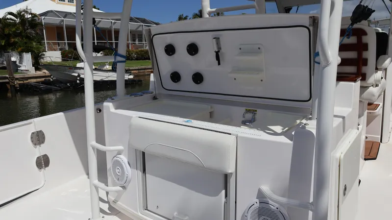  Yacht Photos Pics 2019 Everglades 435 Center Console boat interior with control panel and seating.