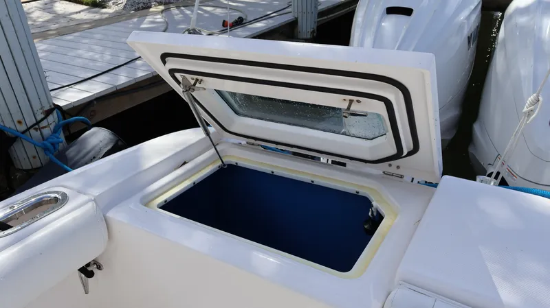  Yacht Photos Pics Open storage compartment on 2019 Everglades 435 Center Console boat.