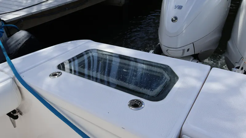  Yacht Photos Pics 2019 Everglades 435 Center Console boat with dual outboard engines and a livewell.