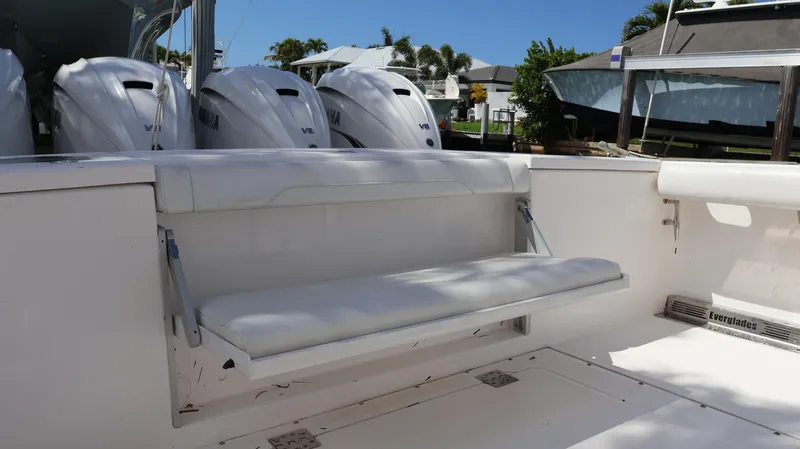  Yacht Photos Pics 2019 Everglades 435 Center Console boat with foldable seating and multiple outboard engines.