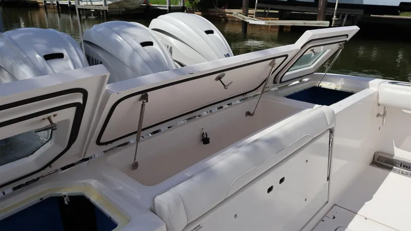  Yacht Photos Pics 2019 Everglades 435 Center Console boat with open storage compartments and powerful engines.