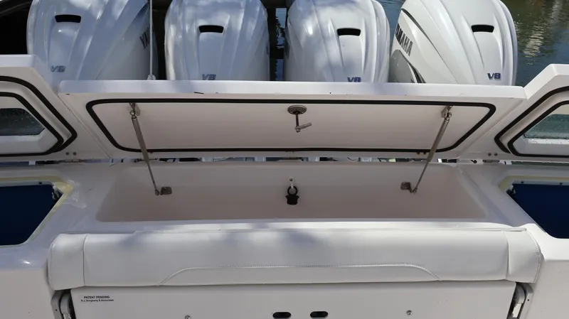 Yacht Photos Pics 2019 Everglades 435 Center Console with open storage compartment and Yamaha V8 engines.
